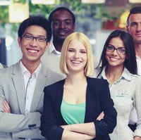 Happy group of co-workers standing in office-1 Happy group of co-workers standing in office-1