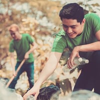 An image of volunteers cleaning up a park