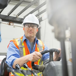 An image of a forklift driver